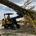 774r-with-log-in-grapple.jpg.webp